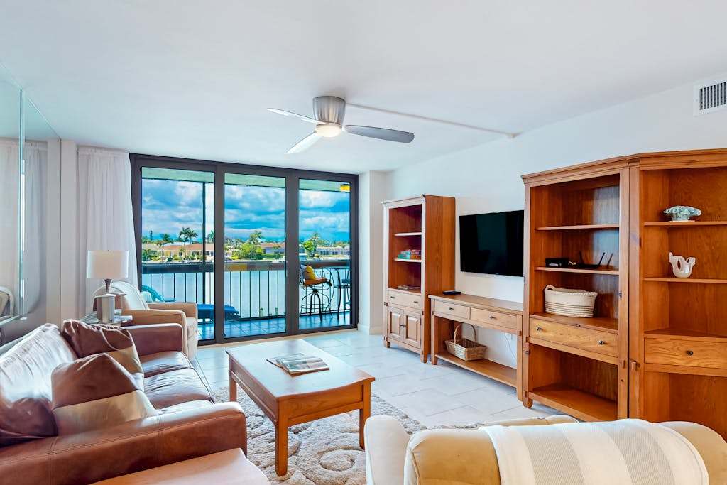 Waterfront condo with bay views pool tennis pickleball beach & dock access