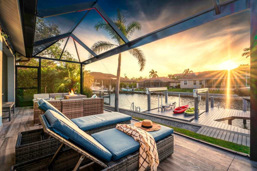 Waterfront house with private pool dock bikes firepit kayak & lanai