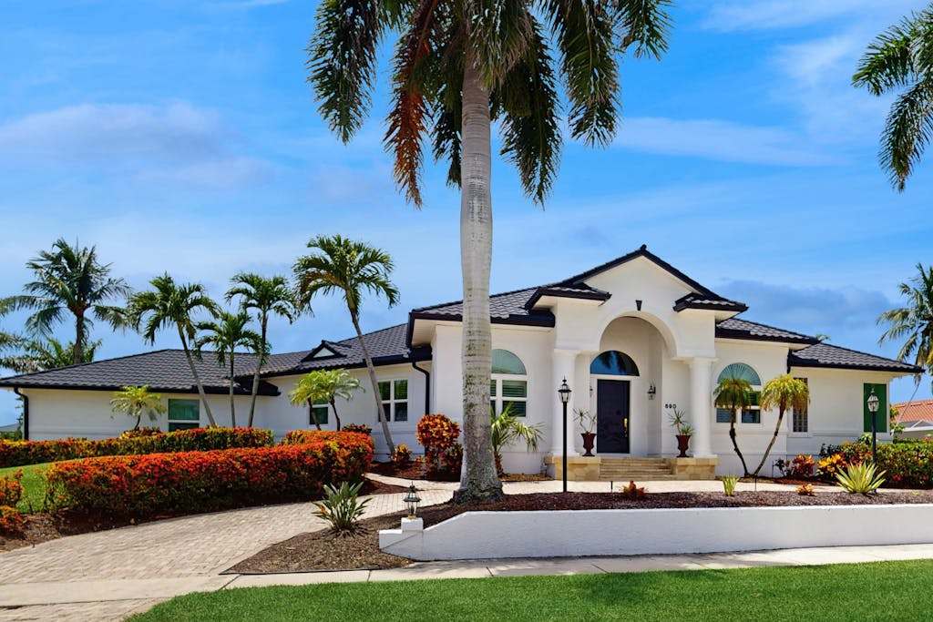 Luxury canal home with pool alfresco dining & walk in shower walk to beach