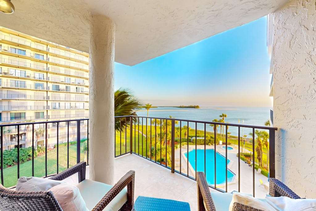 Spacious oceanfront condo with heated pool pickleball tennis gym & balcony