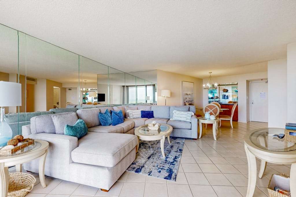 Waterfront gulf view condo by beach with pool dock & balcony