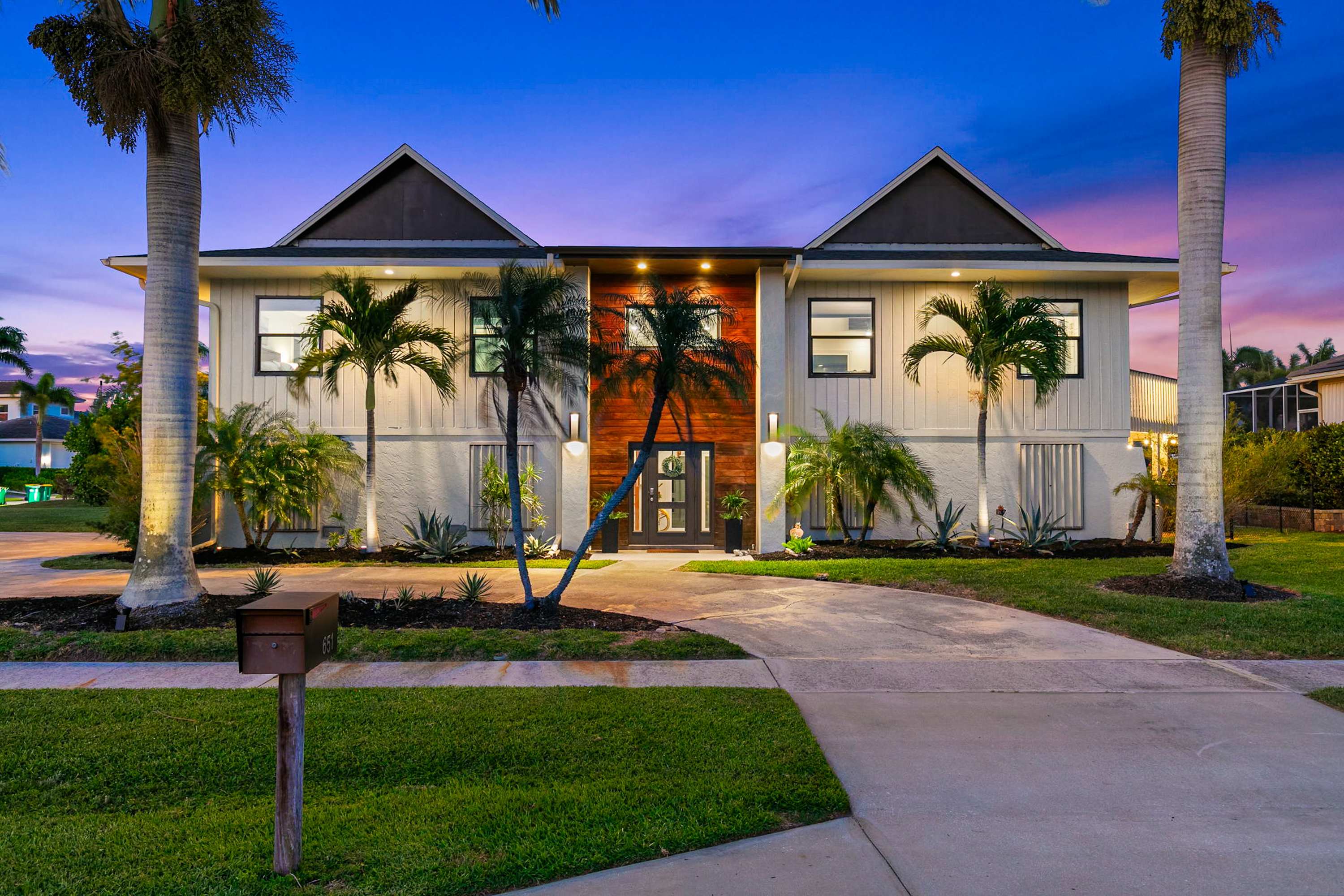 Stunning waterfront home contemporary family friendly close to Gulf with pool