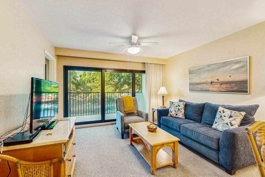Spacious waterfront condo with outdoor pool tennis & volleyball