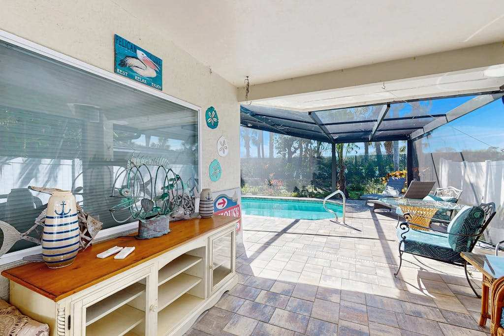 NEWLY RENOVATED - Luxurious Living & Open Concept with Pool on your Naples Retreat