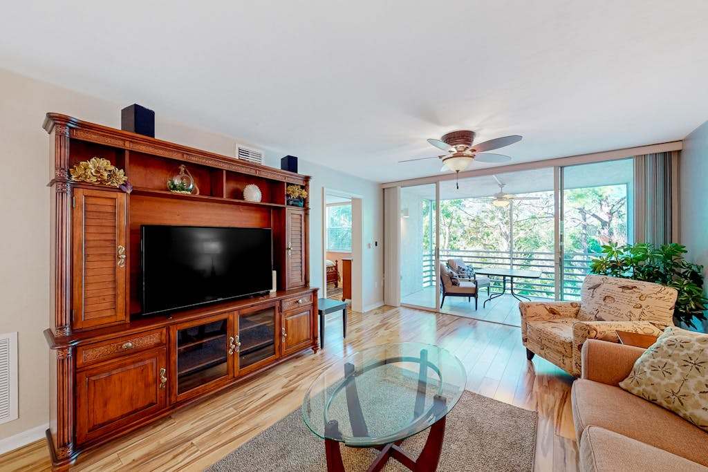 3rd floor snowbird friendly condo with enclosed balcony outdoor pool washer & dryer AC