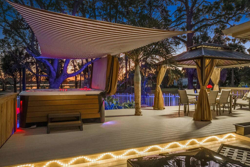 Dog friendly lakefront home with hot tub gazebo firepit outdoor kitchen washer & dryer