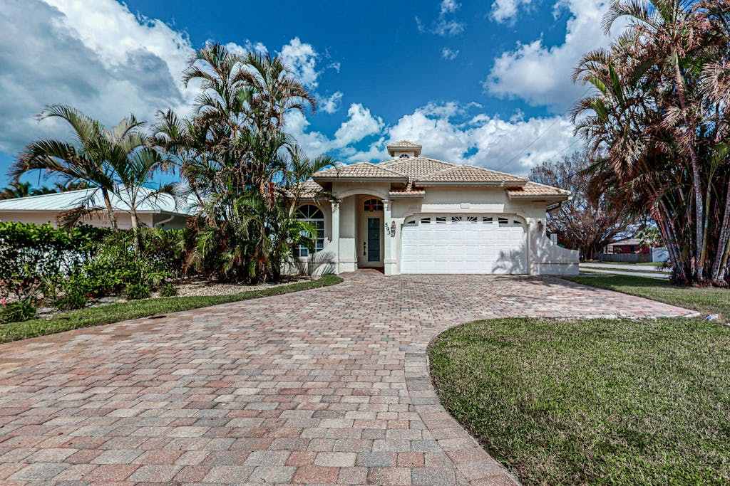 Centrally located home with a private pool & walking distance to beach