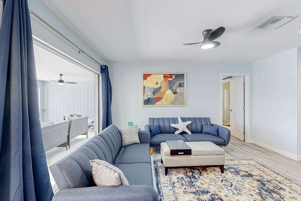 Stylish Waterfront Escape with Sunroom Views Full Renovation AC & Prime Location