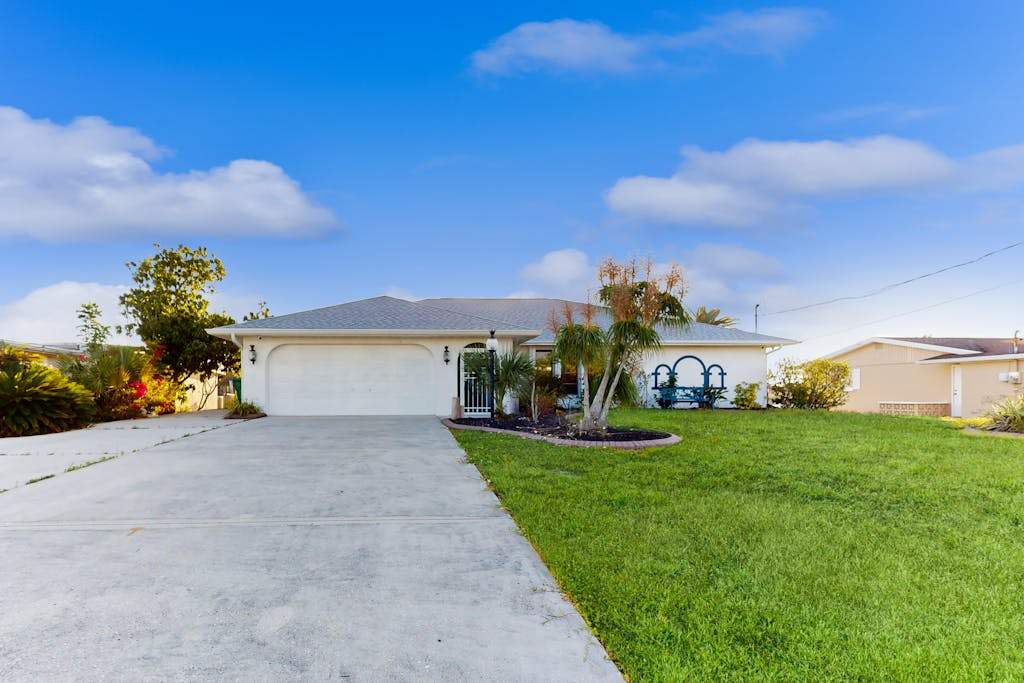 Snowbird Friendly Waterfront Escape with Private Pool Dock & Serene Canal Views