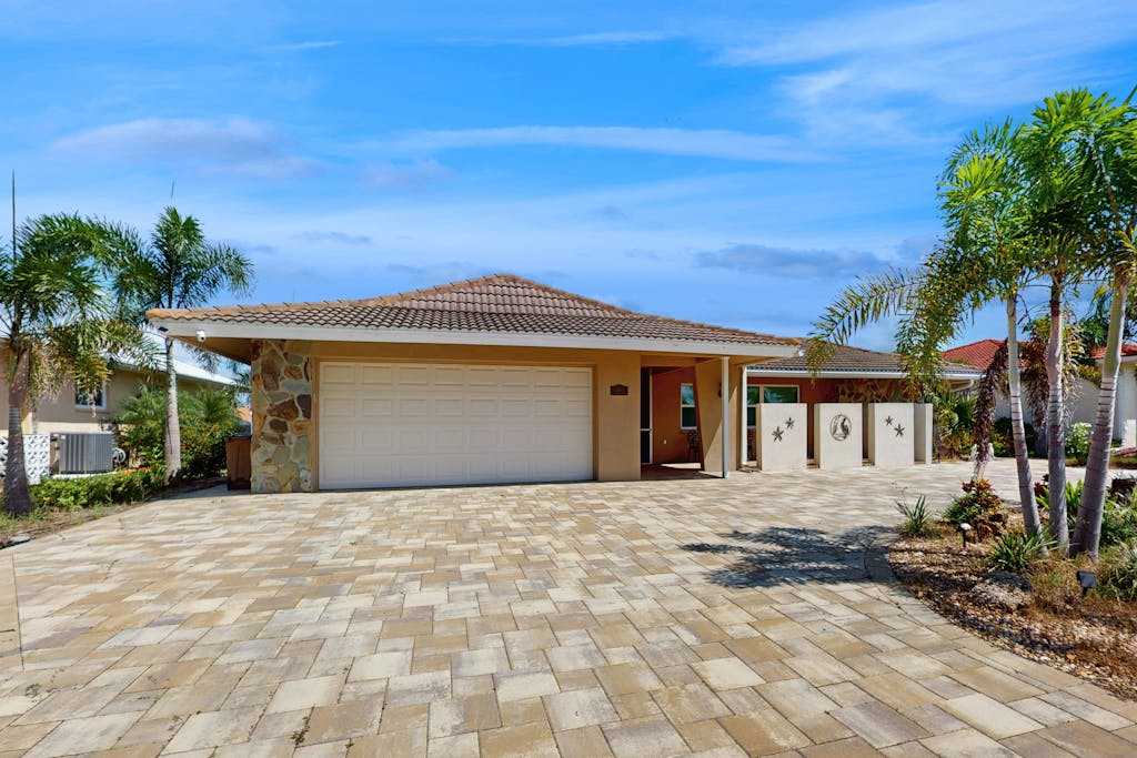 Snowbird Retreat Canal Home with Pool Game Room & Pet Friendly