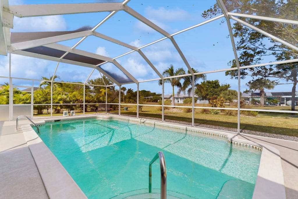 Coastal home with private saltwater pool gas grill & internet