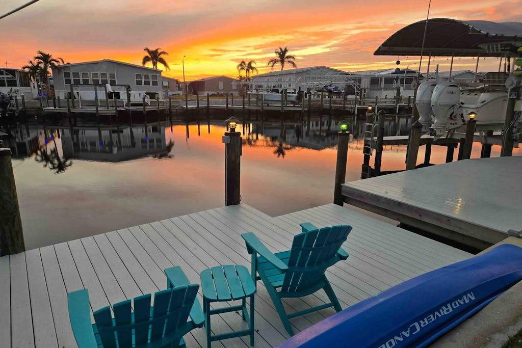 Dog friendly canal front getaway with a dock screened lanai & washer & dryer