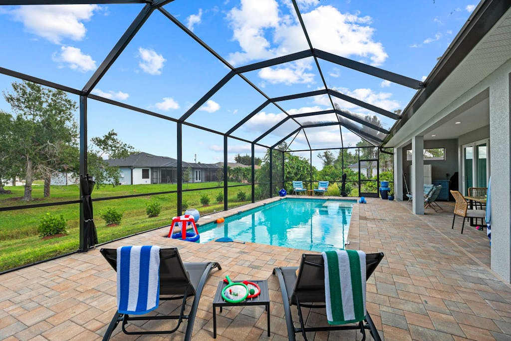 Dog friendly home with private pool lanai family games & internet