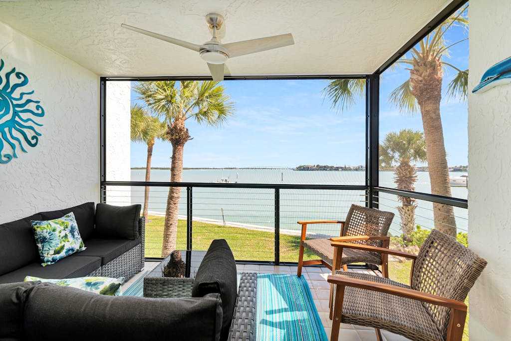 Water view condo with shared pool panoramic balcony views & WIFI