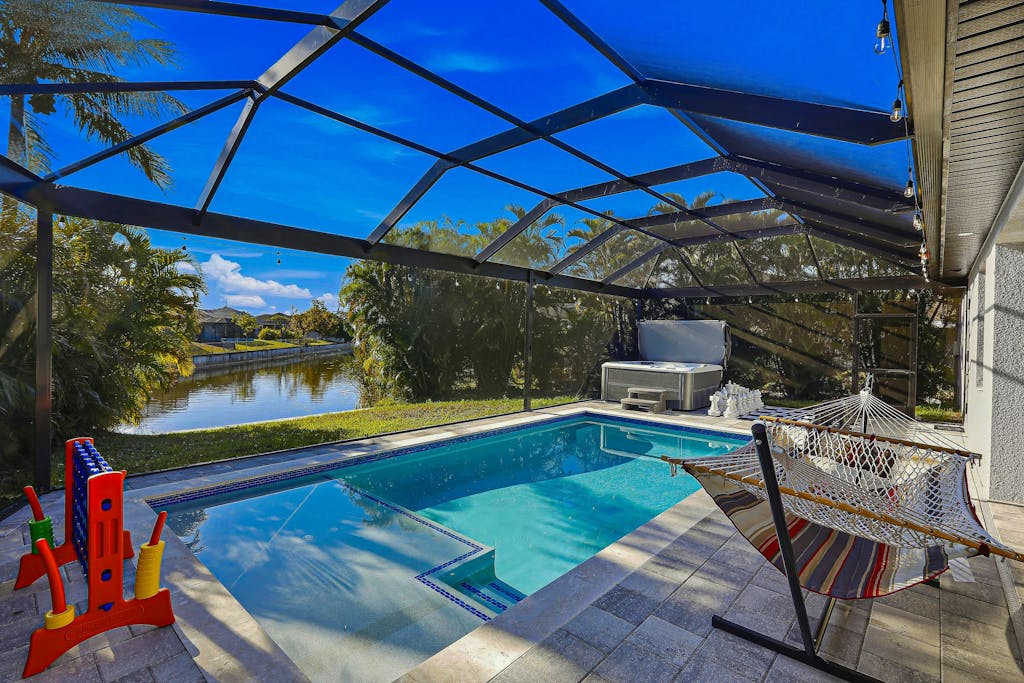 Canal front home with saltwater pool hot tub & washer & dryer