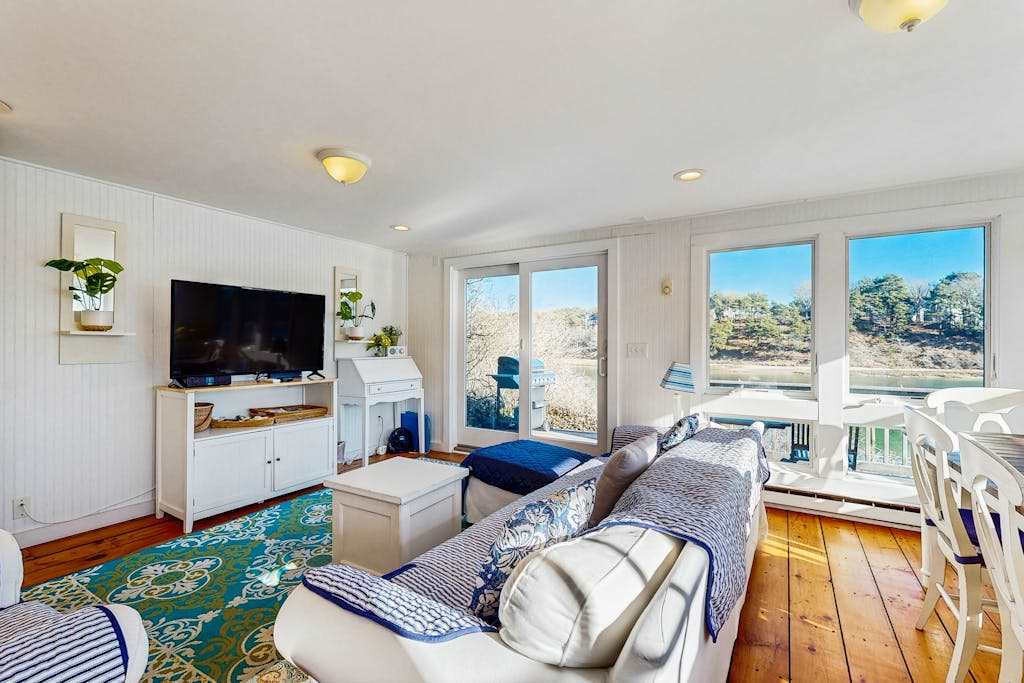 Breathtaking Riverfront Home with a Lovely Deck, Close to Beach - Dogs OK