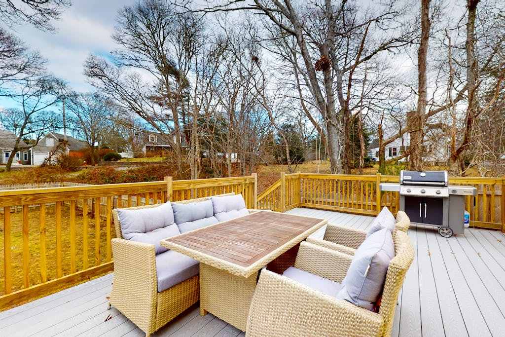 Inviting home and apartment near beach with furnished deck, yard, & grill