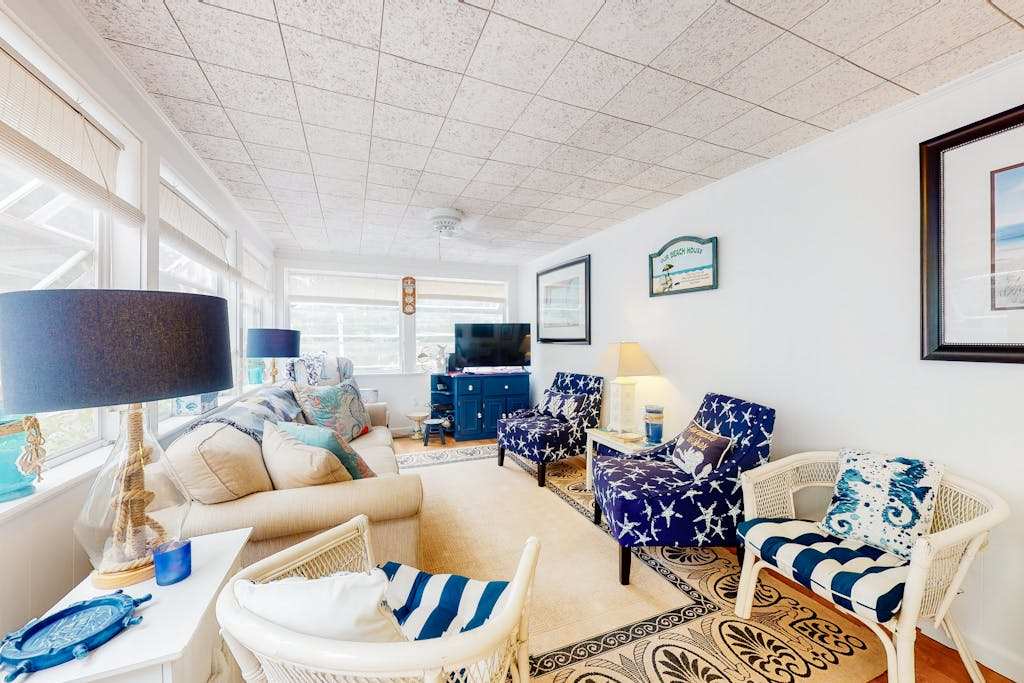 Secluded ranch home with a full outdoor shower & private community beach