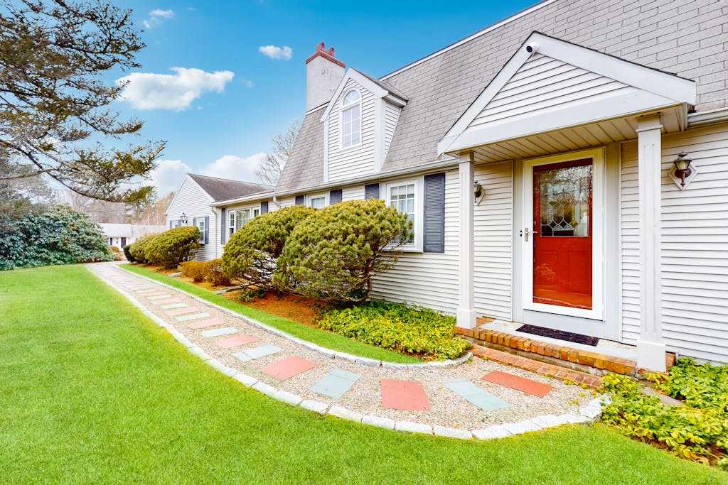 Traditional coastal home with large yard, gazebo, grill, smart TVs, washer & dryer