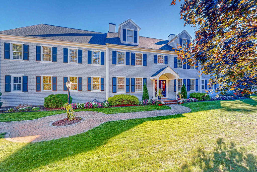 Sprawling dog-friendly lake estate with pool, patio, fire pit, games, & views