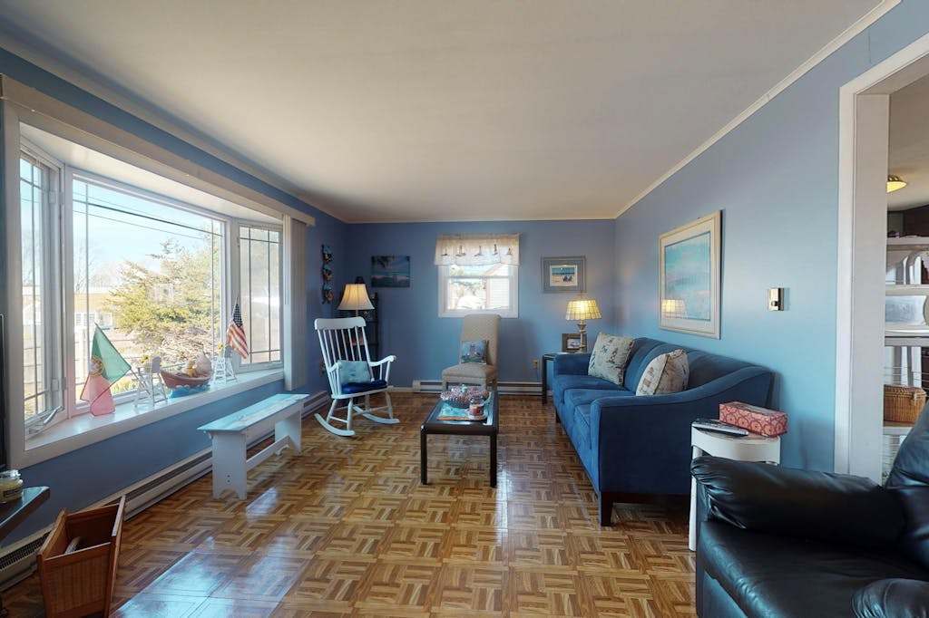 Bright & nautical beach home with enclosed yard & outdoor shower - walk to beach