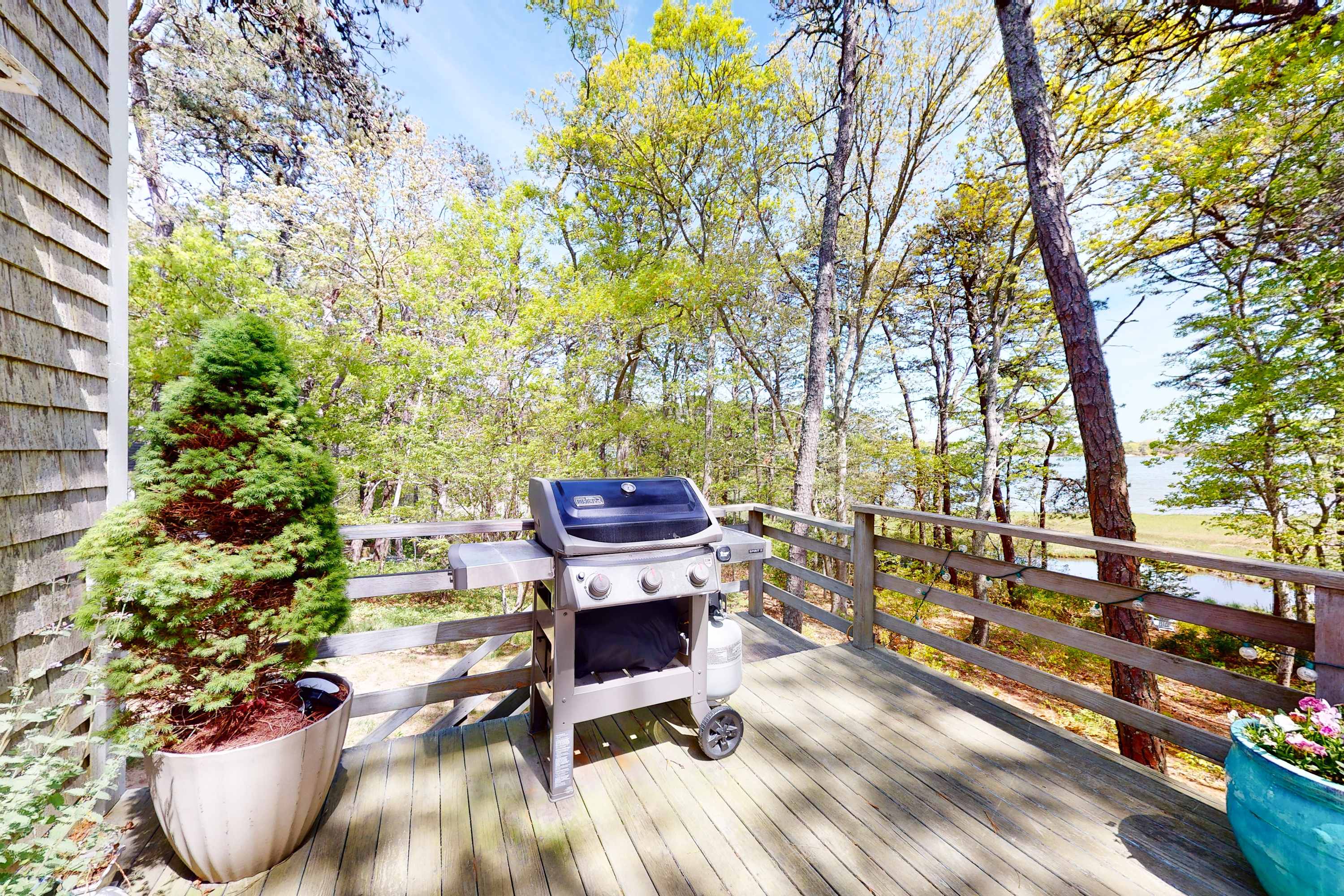 Waterfront escape with gas grill, furnished deck, fast WiFi, beach access nearby