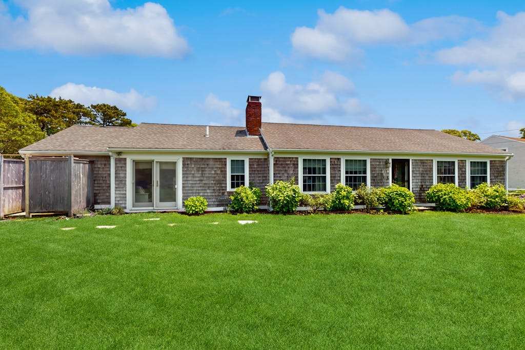 Home near beach, tennis & basketball courts with firepit, grill, & patio