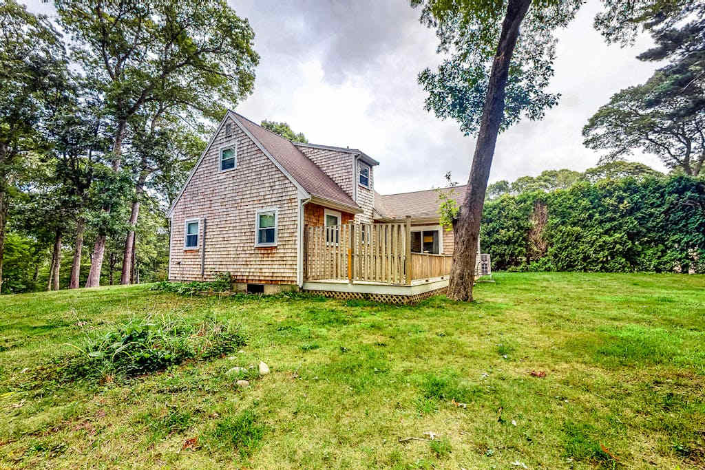 Adorable Home on a Grassy Lot with Free WiFi, Two Living Areas, & a Full Kitchen