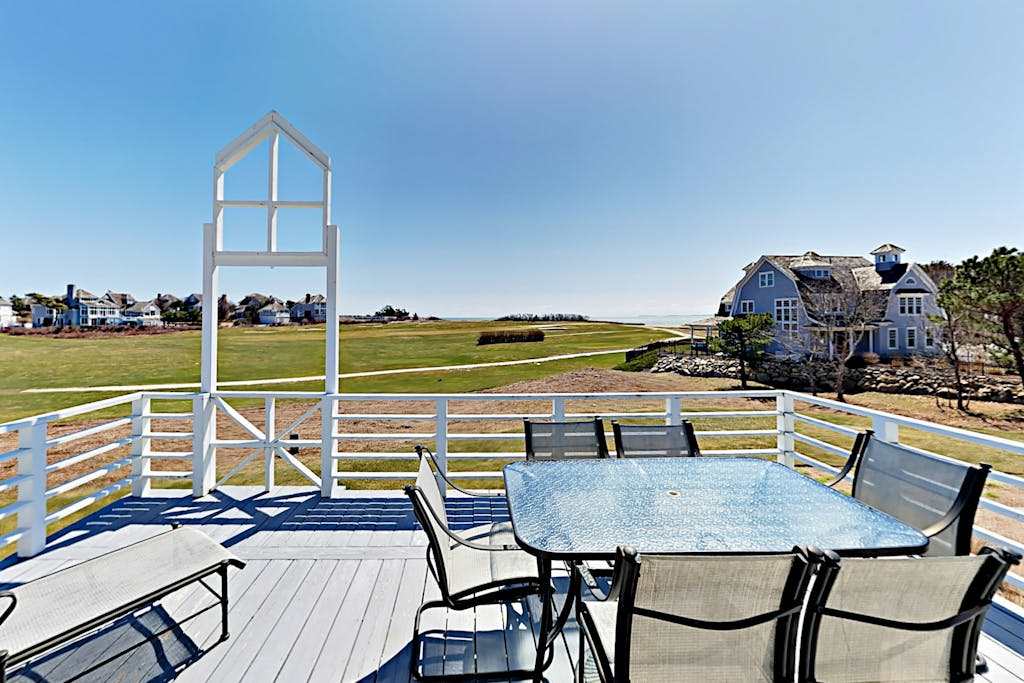 Spacious home on golf course with 4 outdoor spaces overlooking the Sound