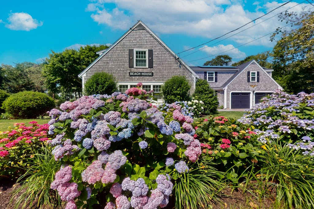 Elegant estate with large deck and lush yard - walk to beach on Nantucket Sound