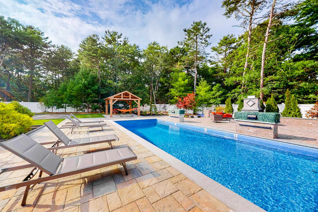 Modern home with dog-friendly yard, private pool & hot tub, pickleball & fast WiFi