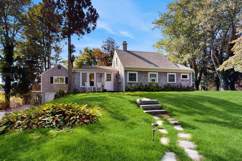 Charming home, great location, A/C, games, washer & dryer, deck, & grill, firepit