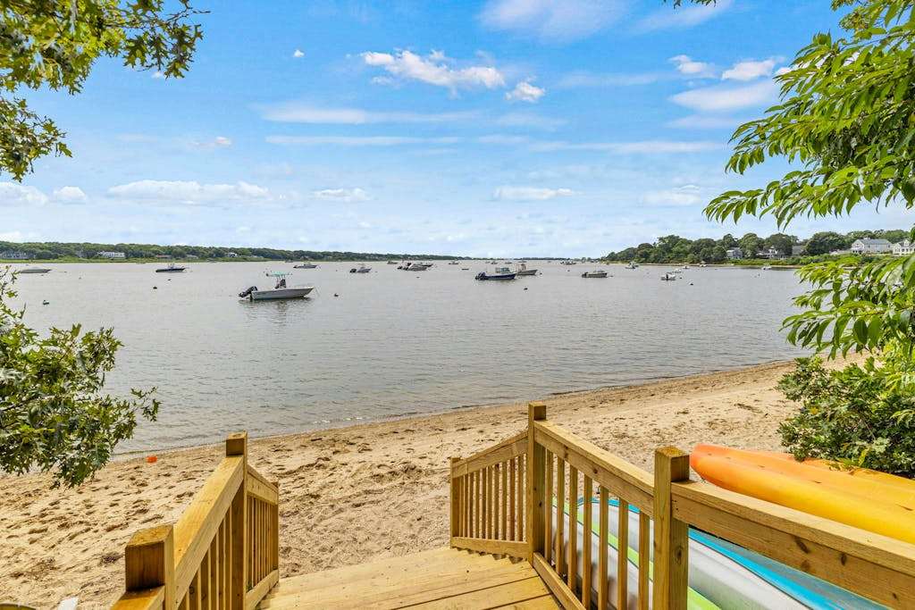 Peaceful Great Pond getaway with private yard, patio, AC & family-friendly games