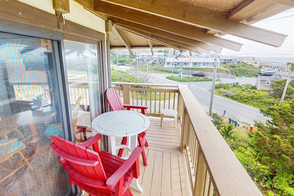 Cozy studio condo with bay views, deck, and beach steps away