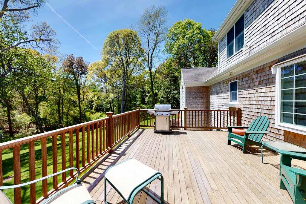 Spacious home with huge deck & tree-lined yard, grill, & WiFi - great location