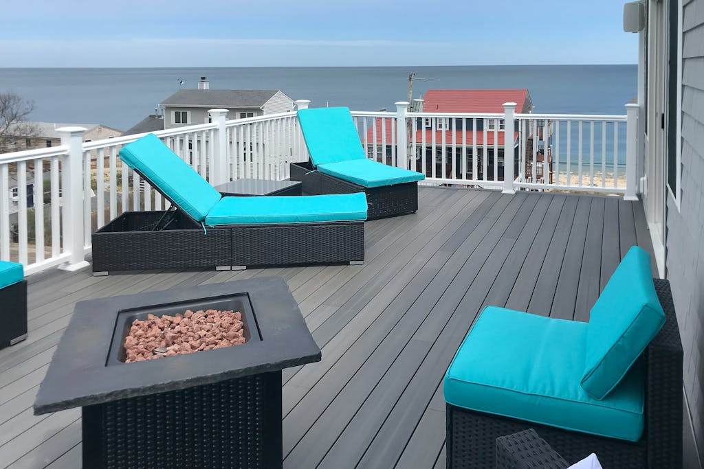 Comfortable home with rooftop deck, beach & water views, washer & dryer, & central AC