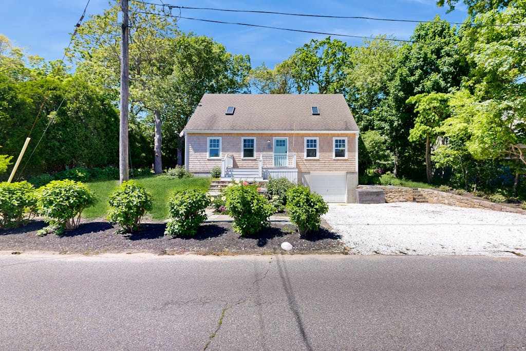 Charming home near downtown & beach with patio, outdoor shower, grill, & washer & dryer
