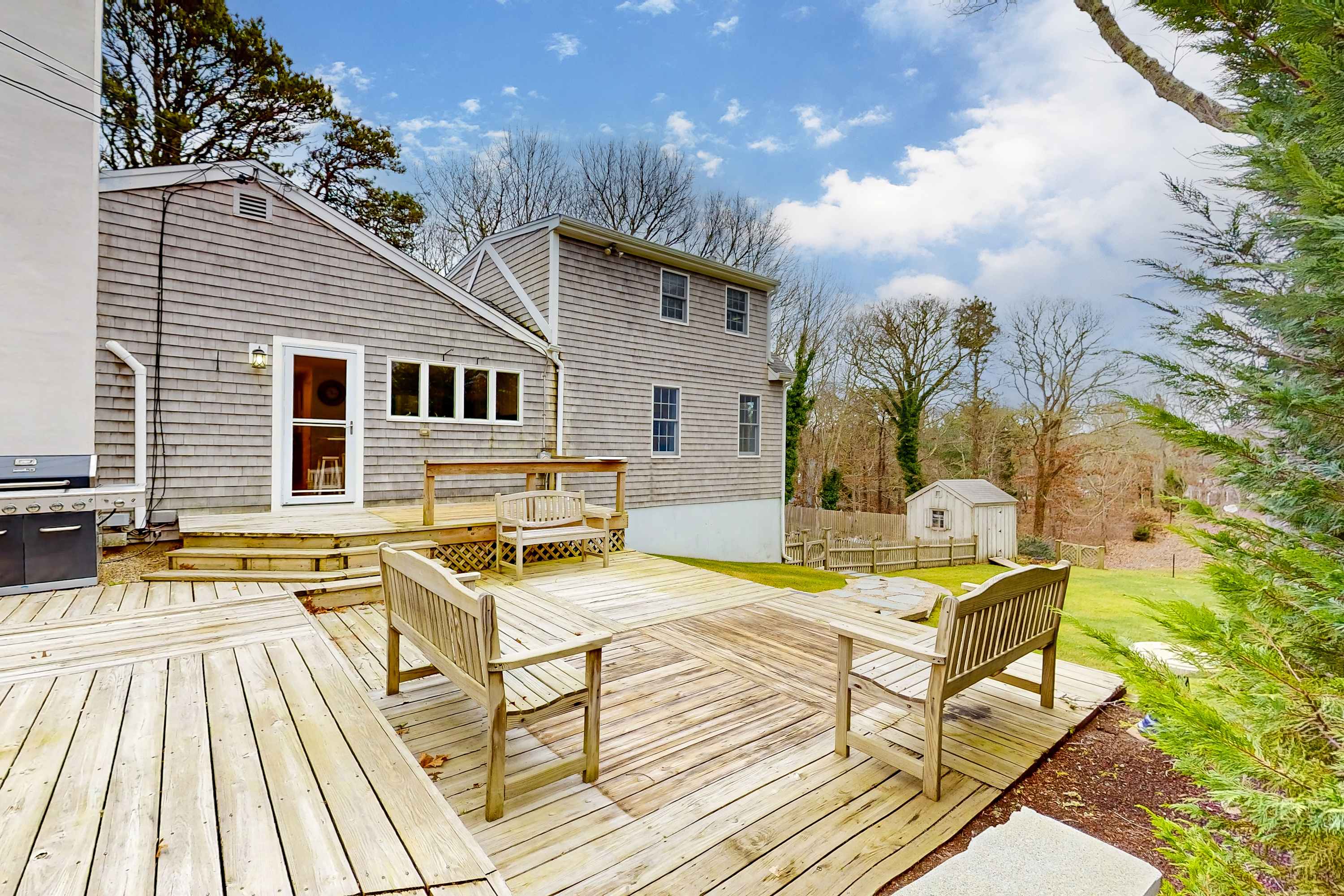Tranquil & sunlit home with peaceful yard, large deck, & fireplace - near beach