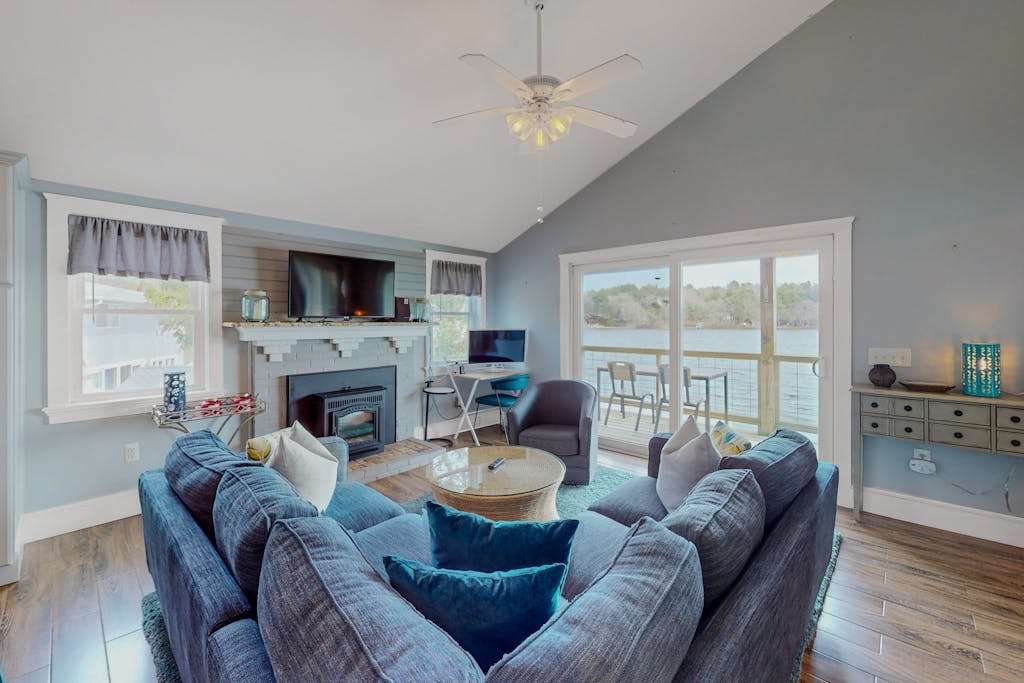 Stunning lakefront home with kayaks, games, & amazing deck views - dog-friendly