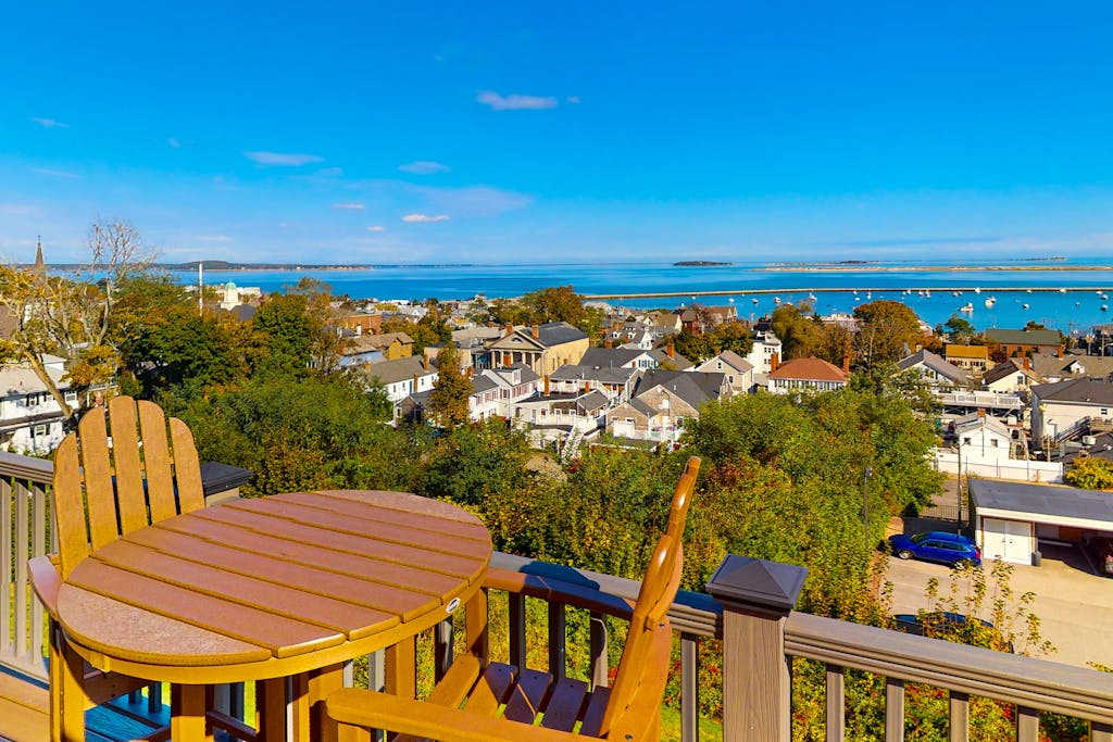 Charming & historical waterfront retreat with patio, washer & dryer, & amazing balcony view