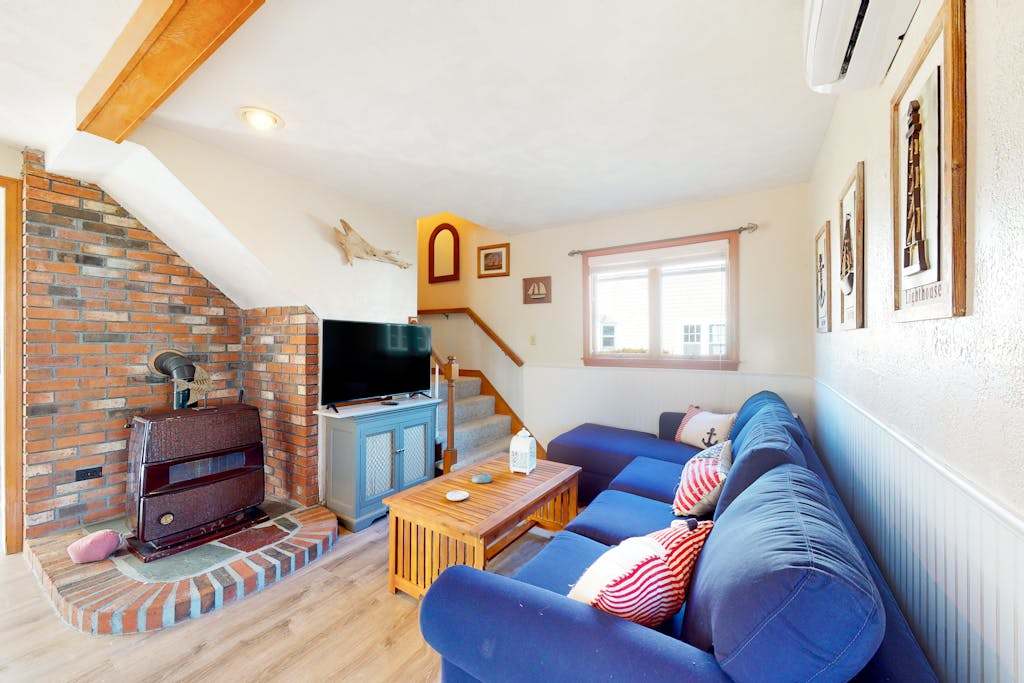 Dog-friendly coastal home steps from beach with grill, firepit, & washer & dryer