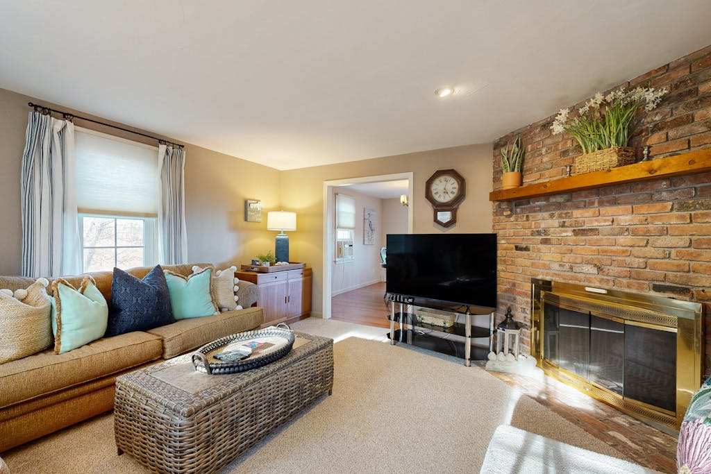 Spacious wooded retreat near canal & beach with deck & alfresco dining