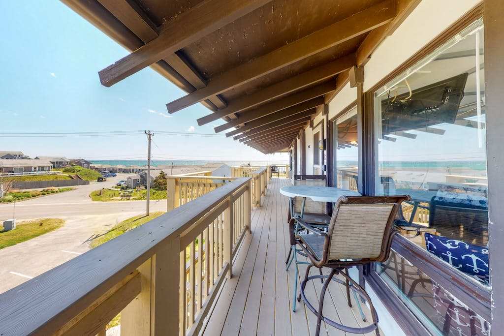 Charming studio steps to beach access with deck, ocean view, kitchenette & grill