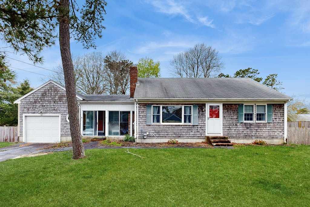Quiet home in central location with deck, washer & dryer, & large yard