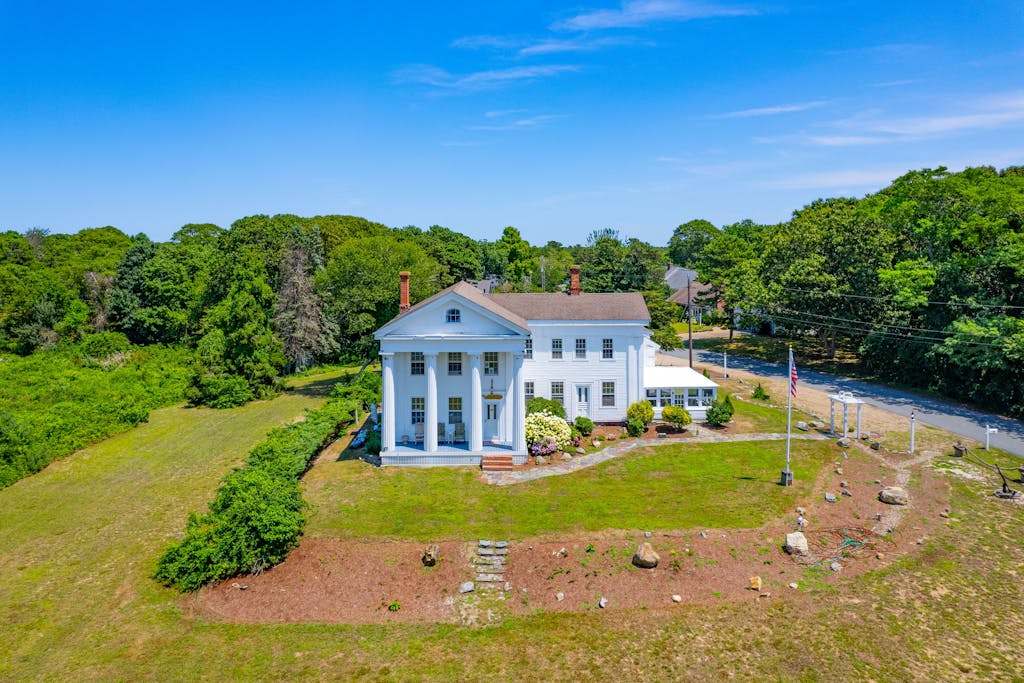 Grand home with historic charm, game room & spacious outdoor living spaces