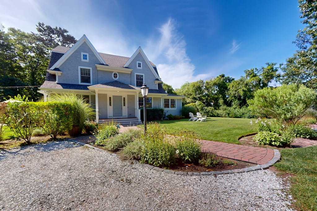 Gorgeously rebuilt Cape Cod estate with lovely grounds, walk to private beach