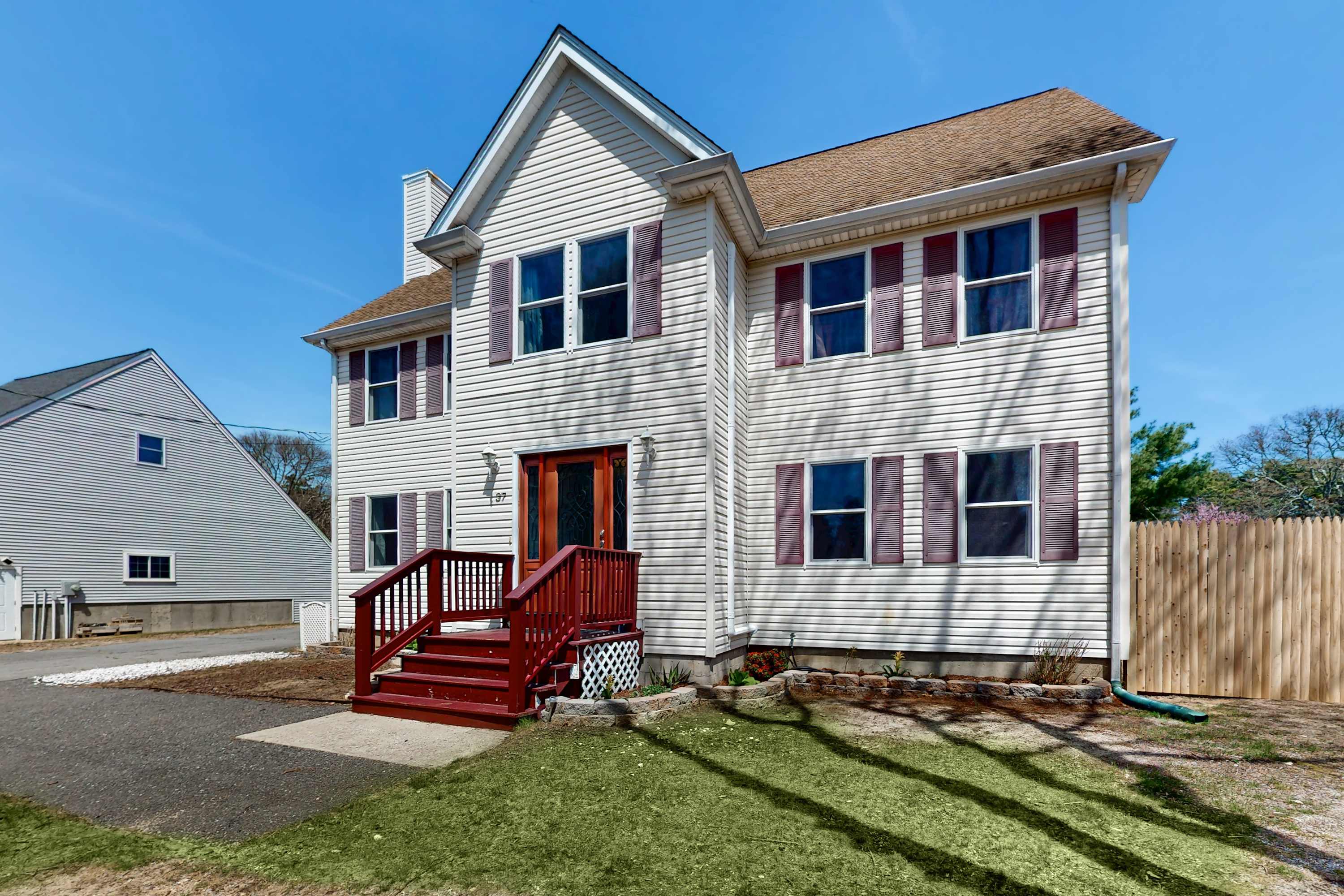 Charming coastal home with sunny rooms, private backyard, & walk to beach