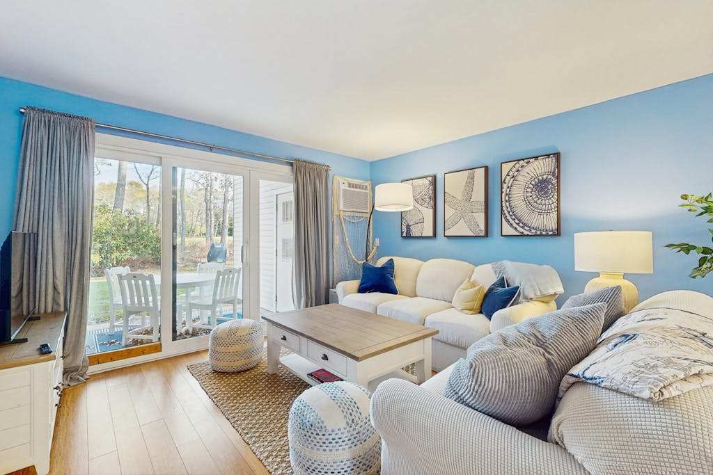 Modern fairway condo with open layout, private patio, AC & washer & dryer