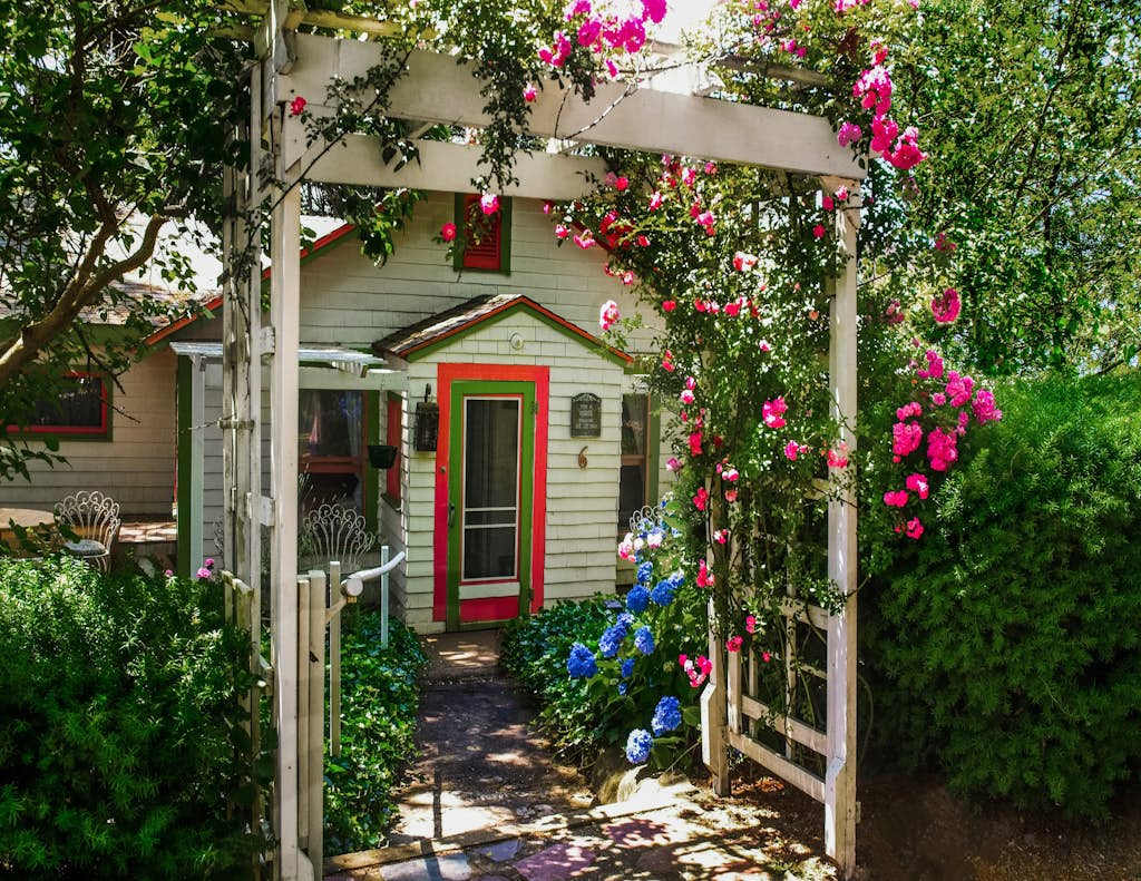 Historic cottage with patio, games, walk to beach & dog-friendly fenced yard