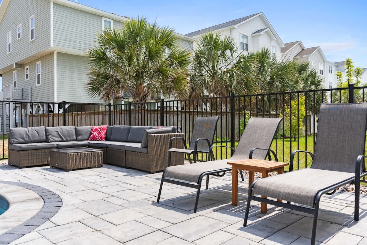 Outdoor Lounge: Dive into fun with our chic seating and sunny poolside oasis!